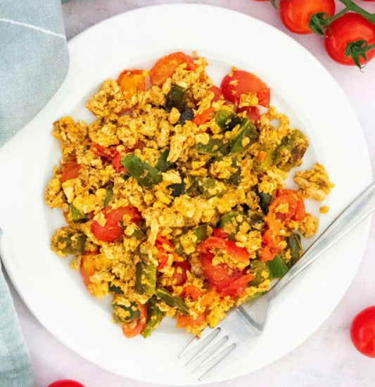 H.e) Latino scrambled egg/ Revoltillo de huevo con tomate